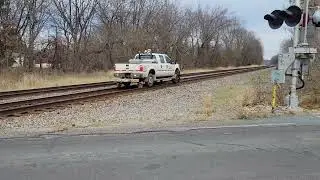 CN highway-railroad FORD F-250 truck rolls Eastbound towards Pavilion, Michigan