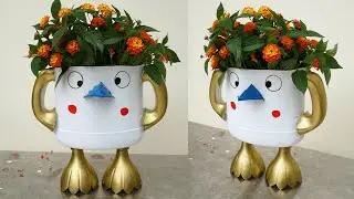 Make a penguin flower pot with an old plastic bottle picked up from the landfill