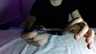 Easiest way to do a thumbaround harmonic pen spinning trick