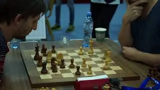 Maxime Vachier-Lagrave beats Alexander Grischuk in their first 10'+10