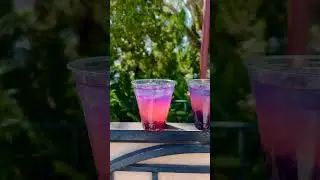 The Dragon Butterfly cocktail!🍹✨ Made with our Conniption Kinship Gin at Disney's Epcot Joy of Tea!