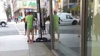 Virtuoso violinist playing in the street barefoot