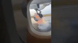 Caught on Camera 🎥: Plane Lands After Tyre Explosion!✈️😱#catchoncamera #tyreburst #shorts #uk