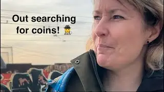 Searching for collectible coins at a British arcade