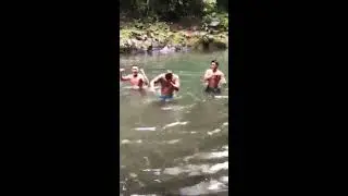Dancing with my brother and my cousin at sauniatu waterfall
