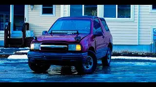 I Put My 2000 Chevy Tracker In The Garage.