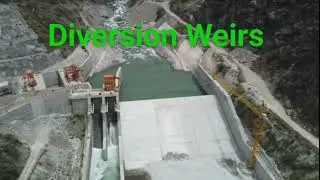 A Diversion Weir is a low dam used to divert river flow for Irrigation or Hydropower.