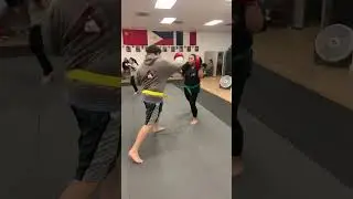 Coach Mikey killing it during Colored Belt Kickboxing. Working on Combos 1-5 with a Highline Return