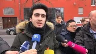 Syrian refugee, hounded over Merkel selfie, sues Facebook