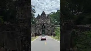 Driving through the west gate of Angkor Thom #asiantravel #angkorwat #angkorthom