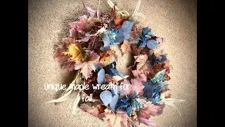 Mauve and navy blue themed fall maple leaf wreath