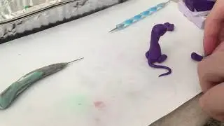 Making a dragon out of Du-Kit polymer clay.