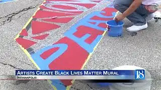 Artists paint 'Black Lives Matter' Indianapolis street mural