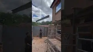 Crane lifting steel over house 🏗️🏗️ #builder #structure #steel #homeextension #brickwork #uk