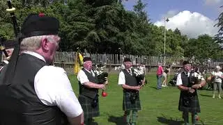 Members of the Gordon Highlanders Association Drums & Pipes (Aberdeen) playing in Aboyne 2019