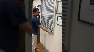 Security Shutter Covering Drive Through Window at Pharmacy