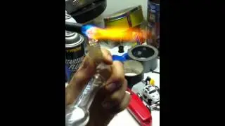 Smoking hash oil out of a nail and dome