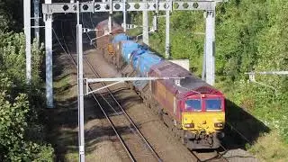 UK: Rail Head Treatment Train (RHTT) passes Reading West powered by DB Cargo Class 66 locomotives