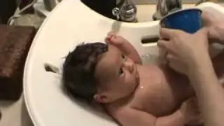 Baby enjoys Puj tub bath