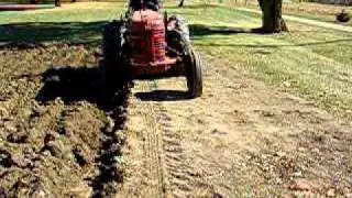 International Harvester 300 Utility Tractor Plowing 3