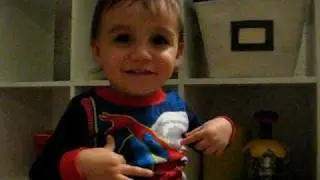Brett pointing to boday parts 16 months old