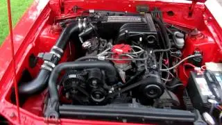 Red Foxbody LX Hatch Mustang