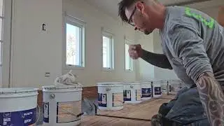 Gluing Down and Ratchet Strapping Reclaimed Flooring