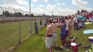 The First lap on the back straight infield Mounds 100th Indy 500