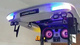 Farmtrac 60 fibre roof canopy and sound system