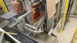 Pytlovac&iacute; linka do ventilov&yacute;ch pytlů - Stavebn&iacute; směsi - automatick&eacute; nasazov&aacute;n&iacute; pytlů