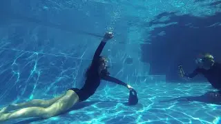 Underwater swimming photoshoot rehearsal in french cut surf suit! #H2opus #GoPro #underwater