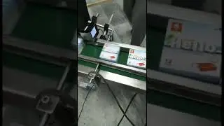 Box over wrapping machine