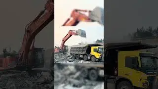 loading excavator on dump trailer