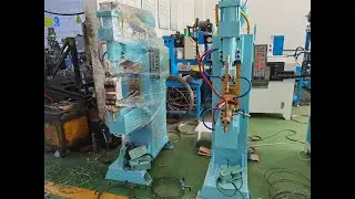 Machine to spot weld ribs for fan guard grill