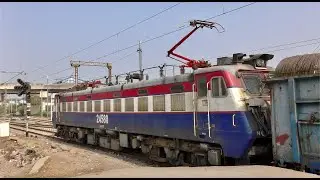 INDIAN RAILWAYS A WAG7 freight locomotive in a WAP4 shell awaits main line signal at Ballabhgarh