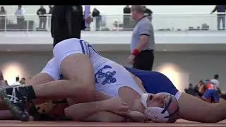 133lbs Joe Ferinde (Johnson & Wales) fall Tyler Craig (USMMA)