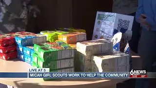Girls scouts at Omaha's Micah House work to sell cookies