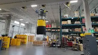 TELESCOPIC CHUTE WITH DUST CONTAINMENT SHROUD
