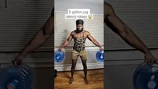 He lateral raise 5 gallon water jugs 🤯 #shorts