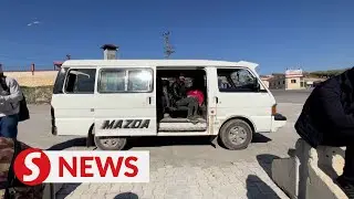 After devastating quake, Syrians return home to war zone