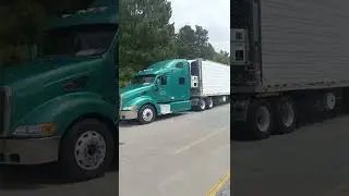 Beautiful teal Peterbilt big rig visor lights cutouts tailored fuel tank cover windows in sleeper