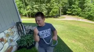 Vander catching a blue racer.