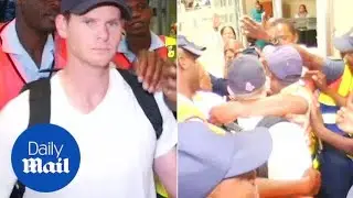 Police assist Smith through airport as media scuffles breakout - Daily Mail