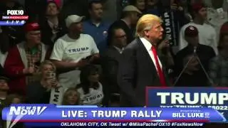 A Protester Wearing A KKK Shirt At A Trump Rally Gets Owned
