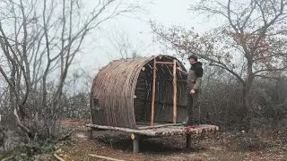 Building a round shelter a natural way to survive without technology.