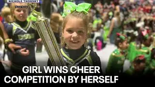 8-year-old girl wins team cheer competition by herself