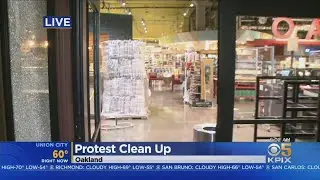 Oakland Protest Damage: Crews clean up damage Thursday left over from night of unruly demonstrations
