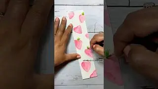 Watercolor strawberry bookmark with gel pen accents #fruitart #watercolorart #artandcraft #artdiy