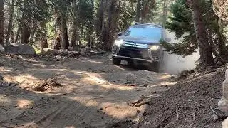 Mitsubishi Outlander off road fire trail above pinecrest lake, ca.