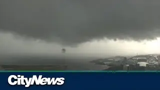 Timelapse of angry storm clouds rolling in over Toronto